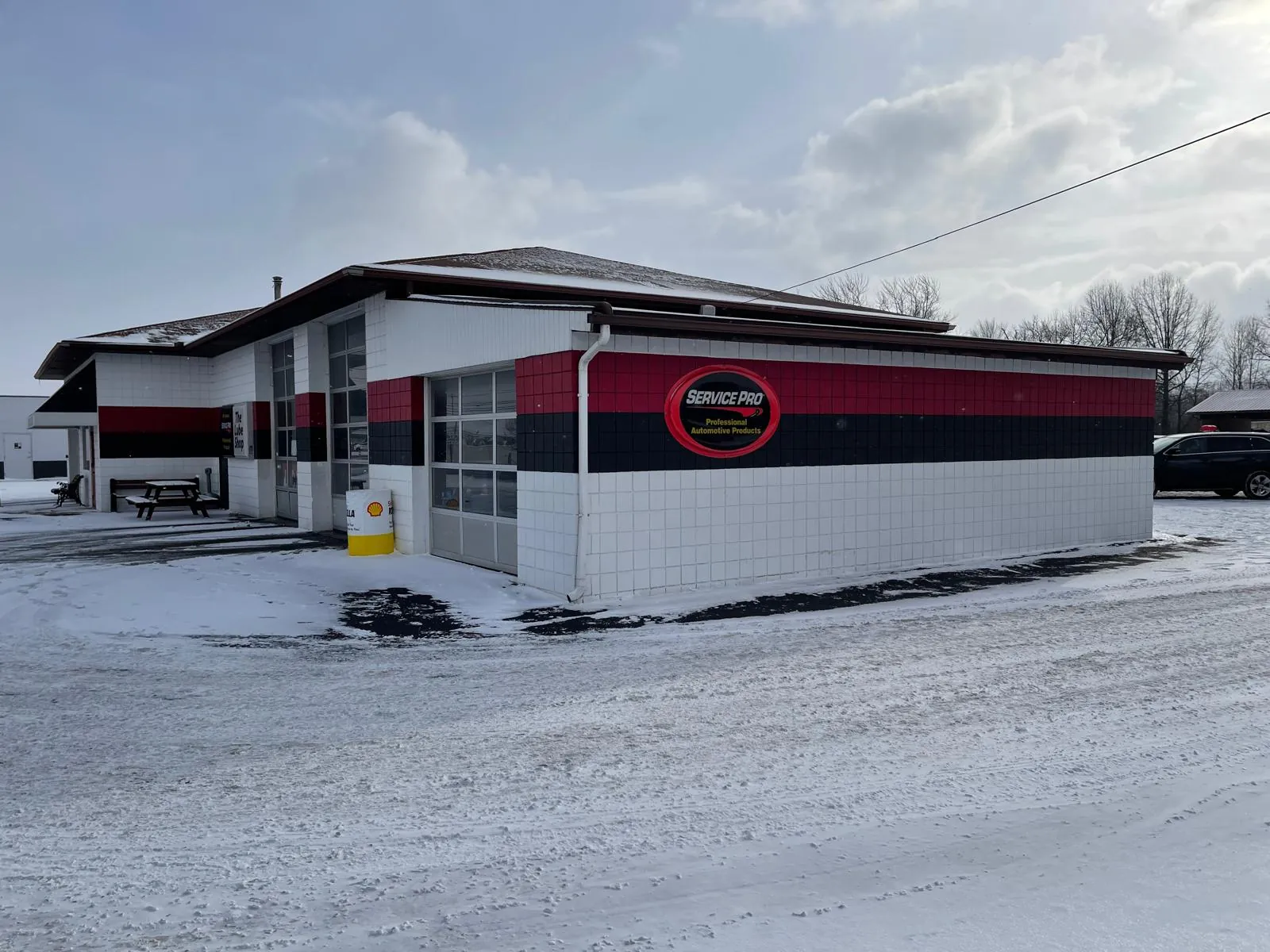 Commercial building addition framed and wrapped while the business stayed open