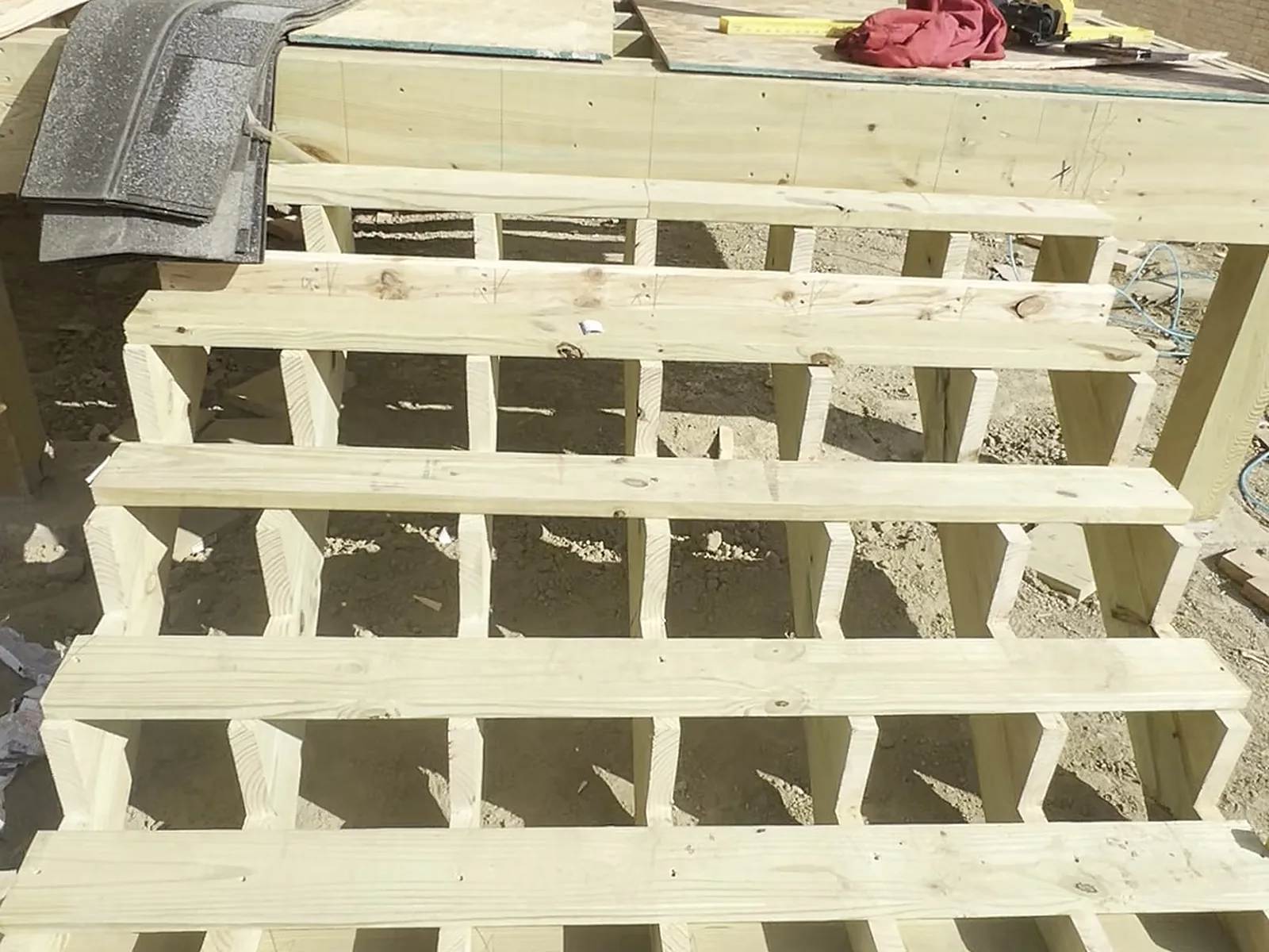 Stair stringers cut and set for exterior steps, Berkley MI