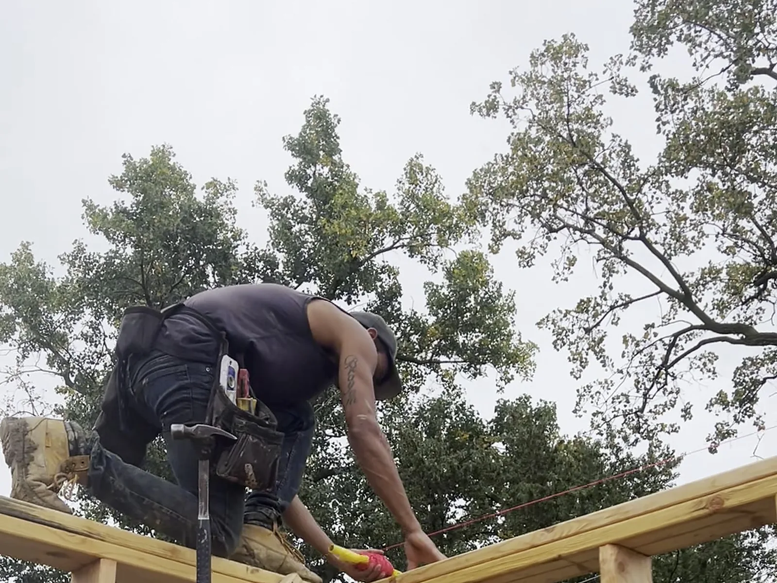 Framer nailing off a second floor wall, Berkley MI